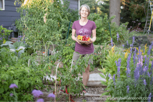 woman holding sweet pepper harvest