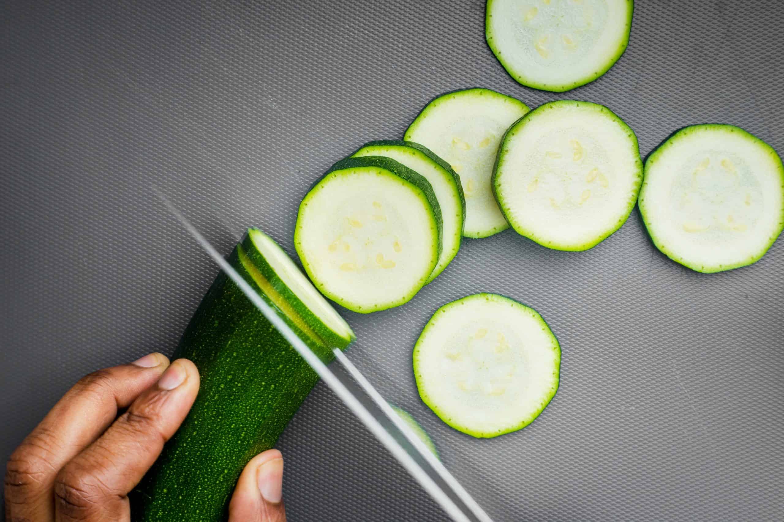 chopping zucchini for freezing